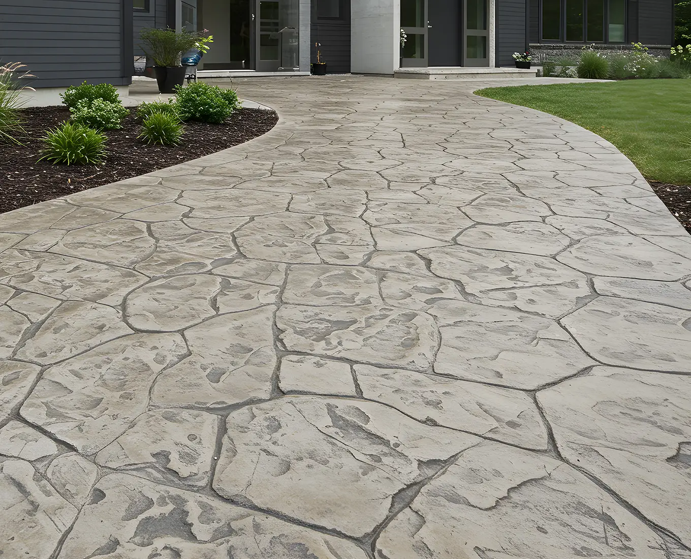 Custom Concrete walkway installed Durable Concrete driveway installed by Arizmendi Brothers in Edwardsville, Illinois